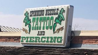Spinning Needle Tattoo